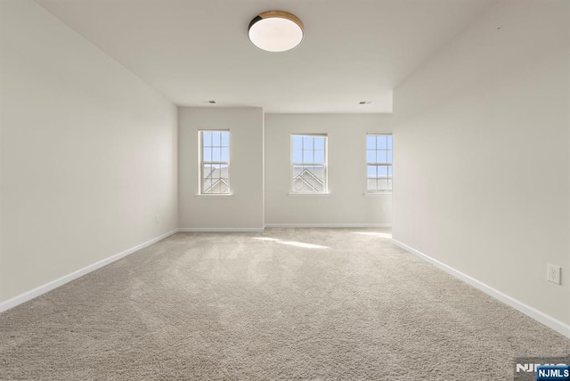 4 Arnold Dr, Wood Ridge, NJ 07075 - empty room with baseboards and carpet