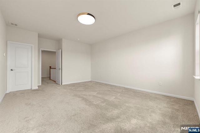 4 Arnold Dr, Wood Ridge, NJ 07075 - unfurnished bedroom with visible vents, baseboards, and light colored carpet