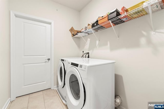 4 Arnold Dr, Wood Ridge, NJ 07075 - washroom featuring independent washer and dryer, light tile patterned floors, laundry area, and baseboards