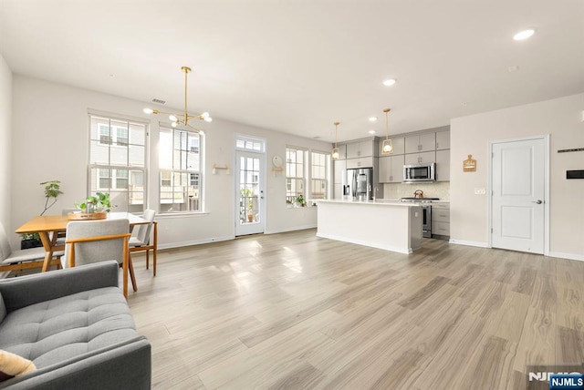 4 Arnold Dr, Wood Ridge, NJ 07075 - living area with recessed lighting, baseboards, and light wood-style flooring