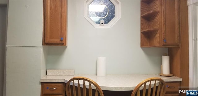 dining space with built in desk