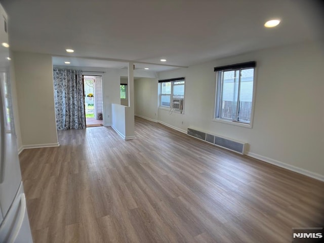 46 Park Dr, Oakland, NJ 07436 - spare room with baseboards, recessed lighting, wood finished floors, and visible vents