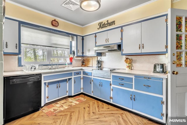 kitchen with blue cabinets, visible vents, light countertops, black appliances, and under cabinet range hood