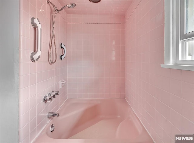 bathroom featuring bathtub / shower combination