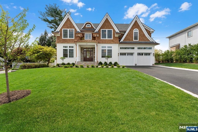 229 Bogert Pl, Paramus, NJ 07652 - shingle-style home featuring a garage, a front lawn, and aphalt driveway