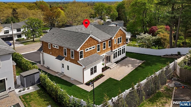 229 Bogert Pl, Paramus, NJ 07652 - birds eye view of property with a wooded view