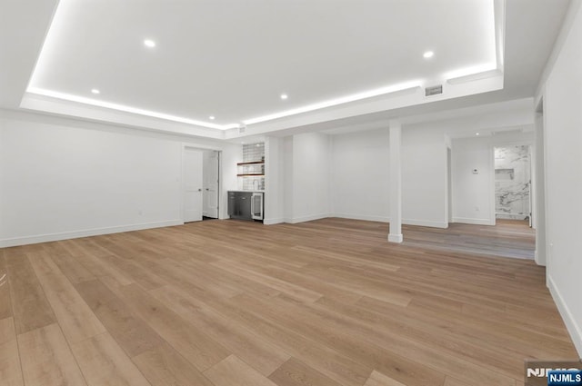 229 Bogert Pl, Paramus, NJ 07652 - basement with recessed lighting, baseboards, visible vents, and light wood finished floors