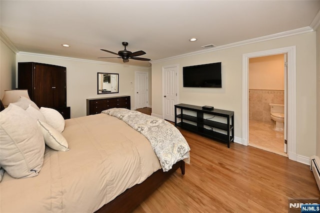 bedroom featuring crown molding, recessed lighting, visible vents, and wood finished floors