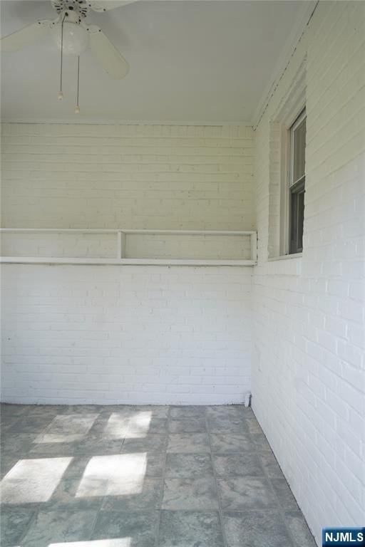 exterior space with a ceiling fan