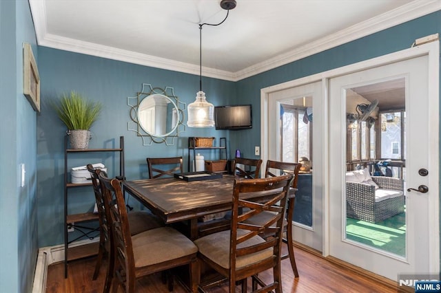444 Washington St, Carlstadt, NJ 07072 - dining area featuring wood finished floors and ornamental molding
