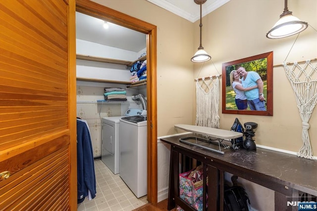 444 Washington St, Carlstadt, NJ 07072 - washroom with washer and clothes dryer and crown molding