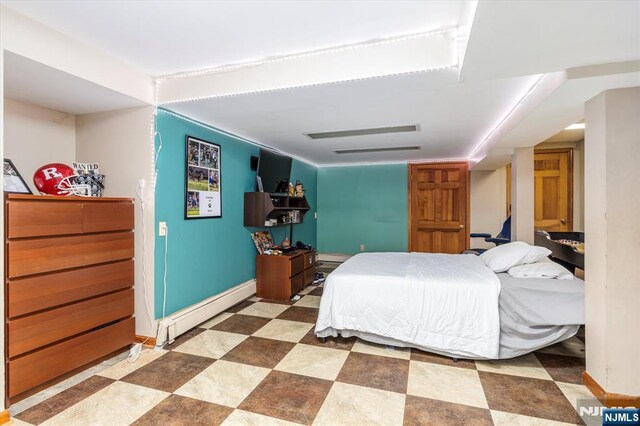 444 Washington St, Carlstadt, NJ 07072 - bedroom with a baseboard radiator and baseboards