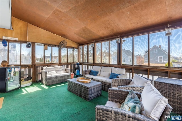 444 Washington St, Carlstadt, NJ 07072 - sunroom featuring carpet flooring, vaulted ceiling, plenty of natural light, and an outdoor hangout area