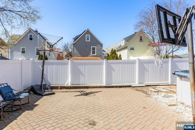 444 Washington St, Carlstadt, NJ 07072 - fenced backyard featuring a patio