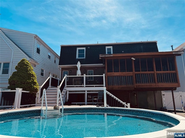 444 Washington St, Carlstadt, NJ 07072 - outdoor pool featuring stairs, a deck, and a sunroom