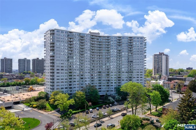 view of property with a city view