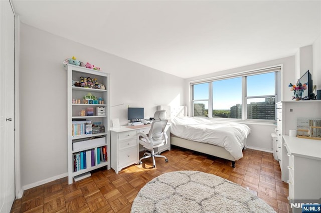 bedroom with baseboards
