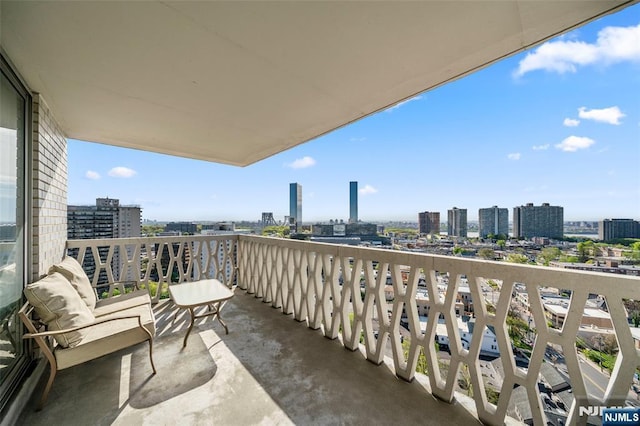 balcony featuring a view of city