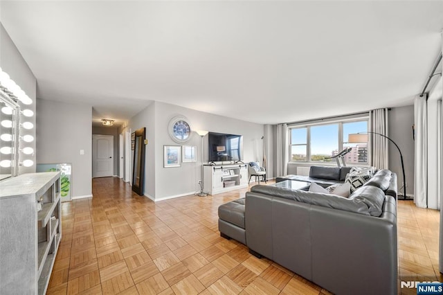 living area with baseboards