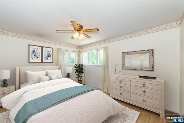 bedroom featuring light wood finished floors