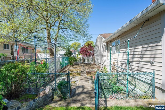 view of home's exterior featuring fence