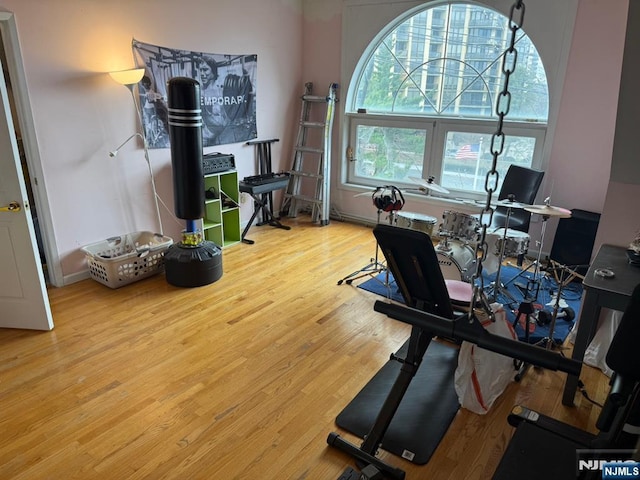 home office with wood finished floors