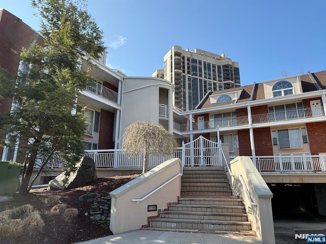 view of building exterior with stairs