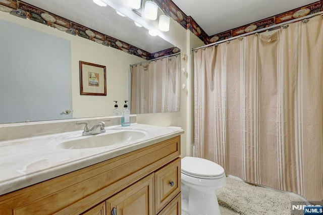 full bath with vanity, a shower with shower curtain, tile patterned flooring, and toilet