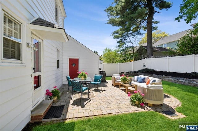 view of patio / terrace with outdoor lounge area and a fenced backyard
