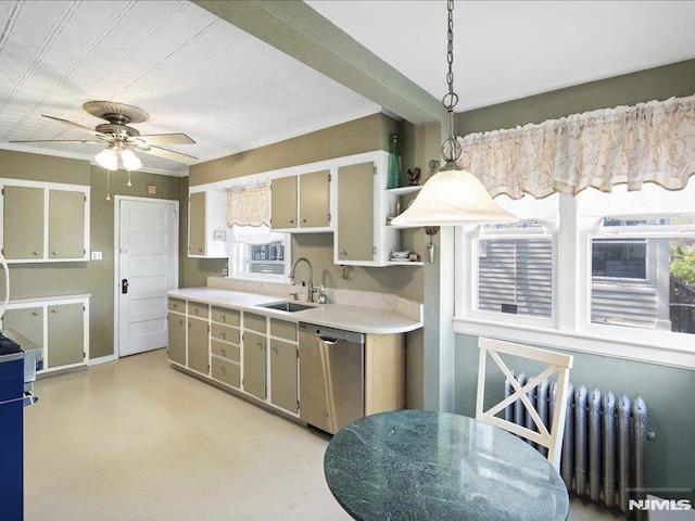 kitchen with radiator, ceiling fan, light countertops, a sink, and dishwasher