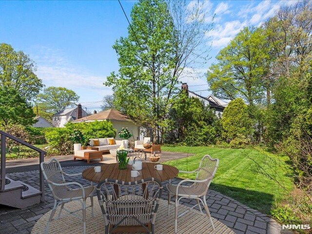 view of patio with an outdoor living space