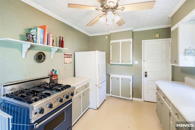 kitchen with freestanding refrigerator, open shelves, ceiling fan, light countertops, and range