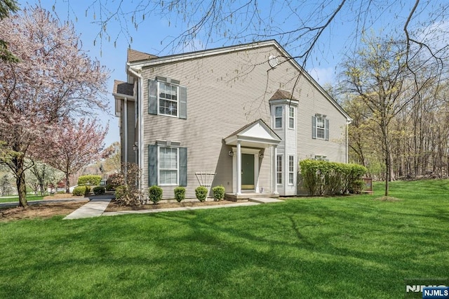 view of front of house with a front yard