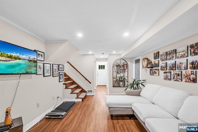 living area featuring stairs, recessed lighting, baseboards, wood finished floors, and visible vents