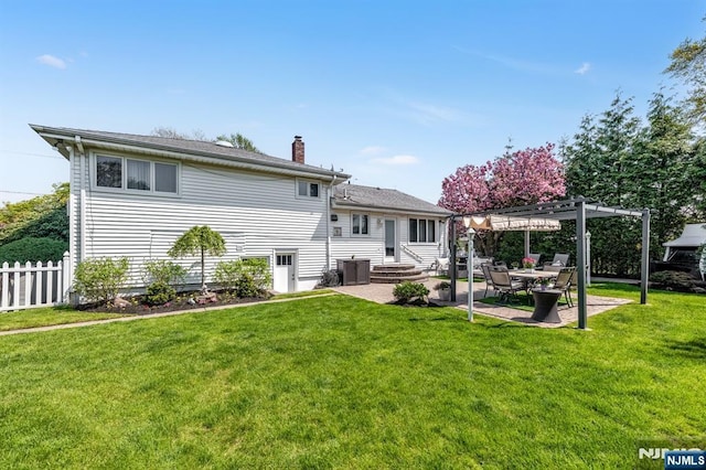 rear view of property with fence, a pergola, a patio, a chimney, and a yard