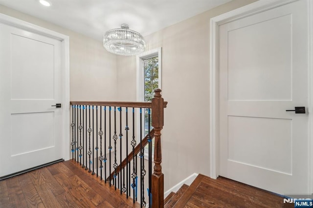 119 Lenox Ave, New Milford, NJ 07646 - staircase with baseboards, recessed lighting, wood finished floors, and a chandelier