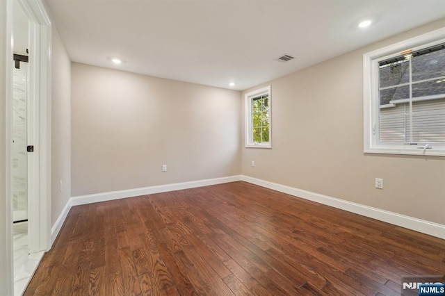 119 Lenox Ave, New Milford, NJ 07646 - empty room featuring baseboards, wood-type flooring, recessed lighting, and visible vents