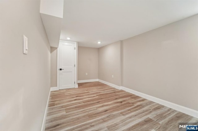 119 Lenox Ave, New Milford, NJ 07646 - finished below grade area featuring light wood-style floors, recessed lighting, and baseboards