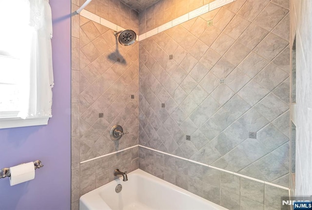 bathroom featuring shower / bath combination