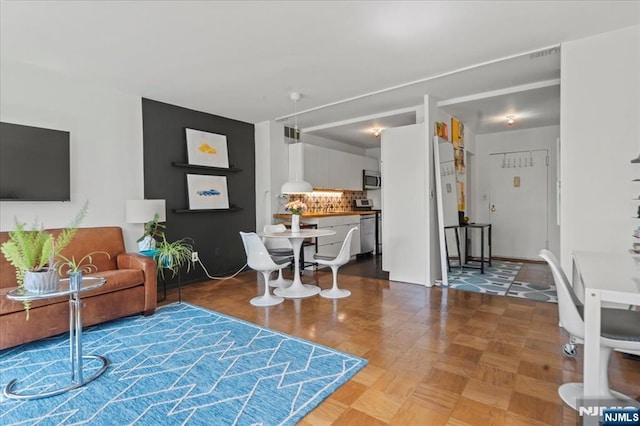living area with visible vents