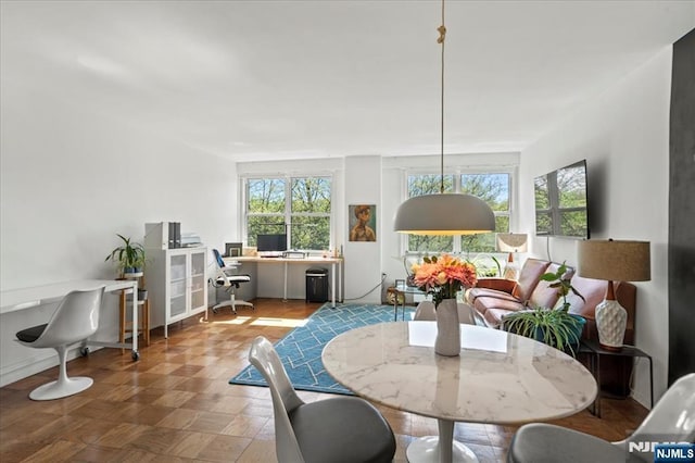 dining space with a wealth of natural light