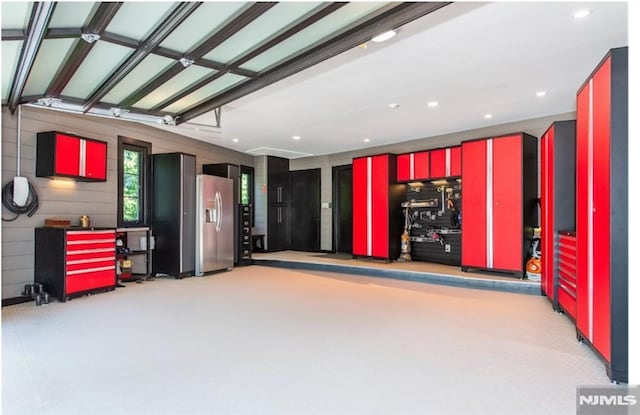 18 Fairview Dr, North Caldwell, NJ 07006 - garage with stainless steel fridge with ice dispenser and recessed lighting