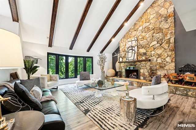 18 Fairview Dr, North Caldwell, NJ 07006 - living room with beam ceiling, wood finished floors, high vaulted ceiling, and a stone fireplace