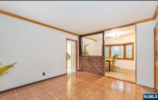 unfurnished room featuring ornamental molding