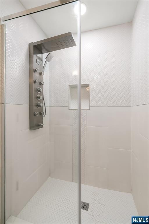518-536 Gregory Ave Unit C408, Weehawken, NJ 07086 - bathroom with a shower stall