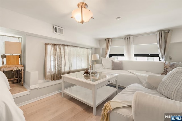 518-536 Gregory Ave Unit C408, Weehawken, NJ 07086 - living room featuring plenty of natural light, light wood finished floors, and baseboards