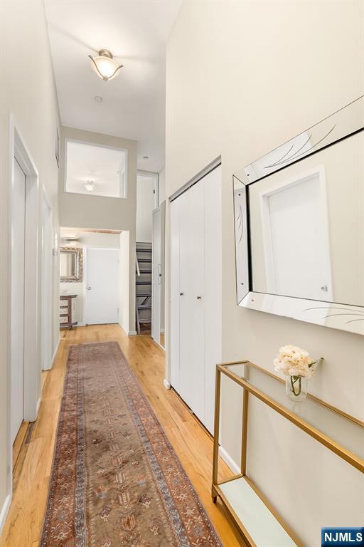 518-536 Gregory Ave Unit C408, Weehawken, NJ 07086 - hall featuring light wood finished floors