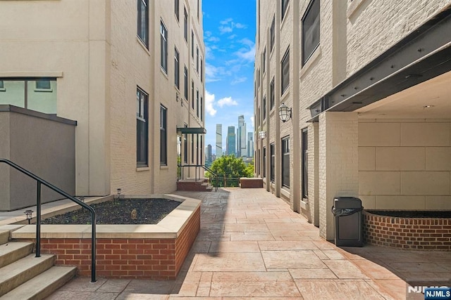 518-536 Gregory Ave Unit C408, Weehawken, NJ 07086 - view of patio / terrace with a view of skyline
