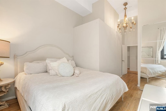 518-536 Gregory Ave Unit C408, Weehawken, NJ 07086 - bedroom featuring wood finished floors and a chandelier