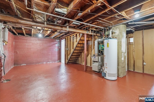 unfinished below grade area with water heater and stairway